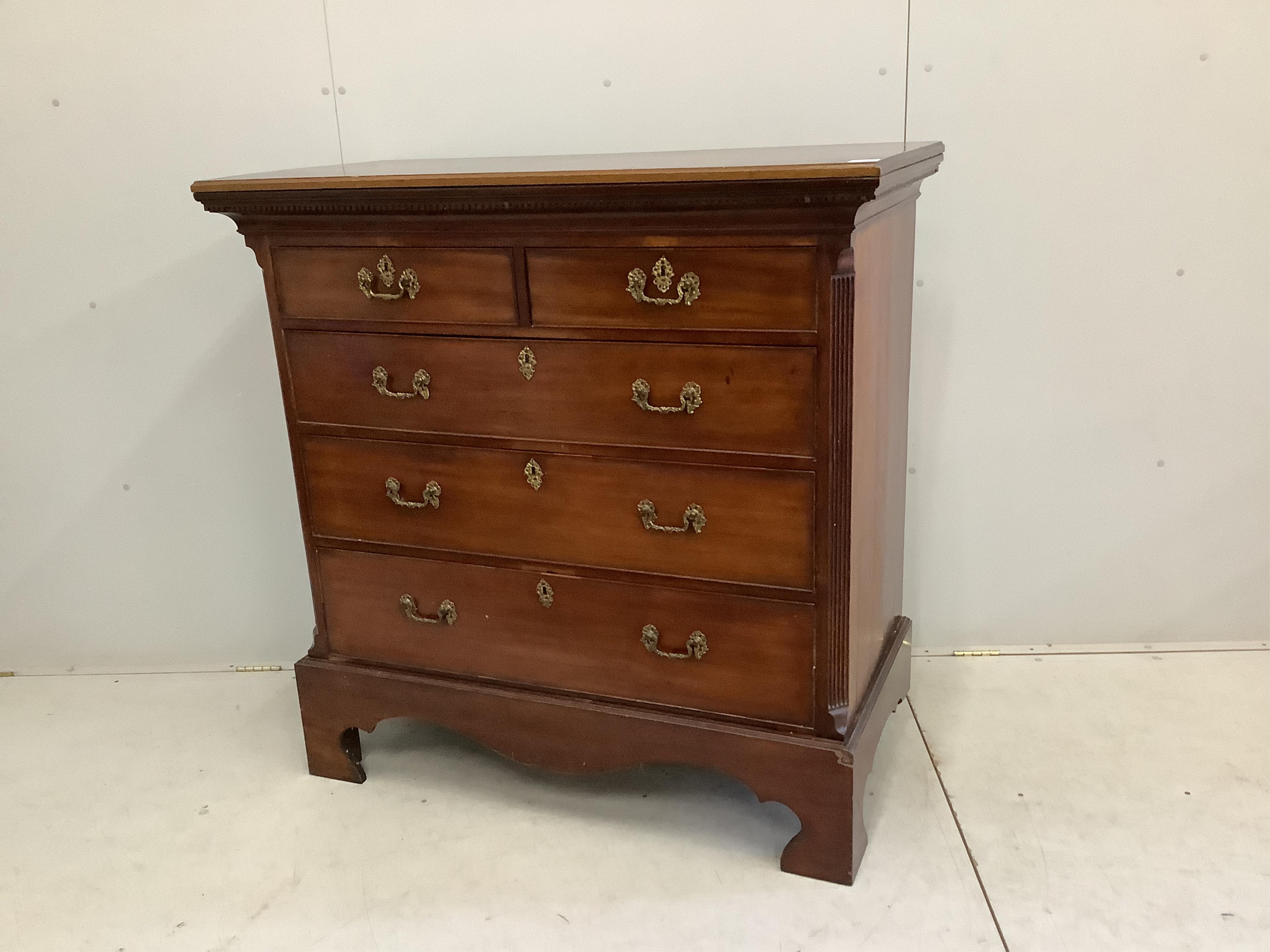 A George III mahogany tallboy top, fitted with two short and three long drawers, raised on later bracket feet, width 119cm, depth 58cm, height 120cm